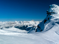 Just before dropping down on skis, looking over the high col.