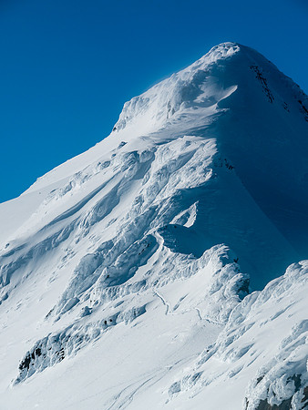 The couple from Revelstoke are barely visible on the massive ridge (right near the top).