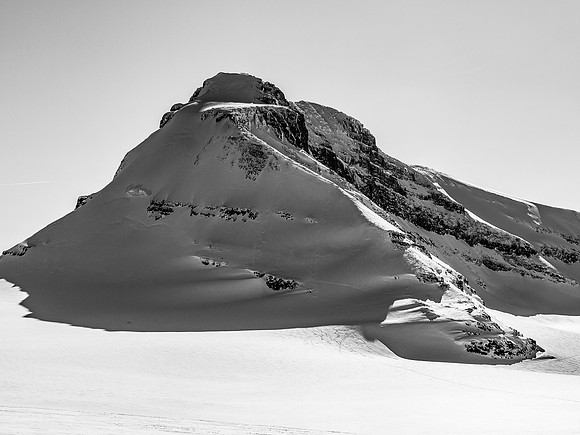 There is a tiny hut on the bottom right ridge of Daly.