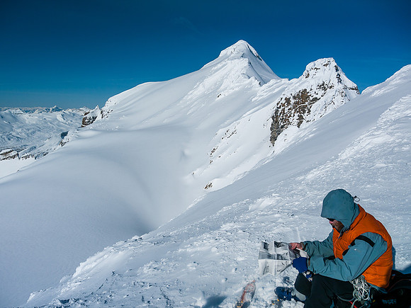 the correct descent slope is about 200m up the ridge in the foreground and bails off to climber's left in front of the obvious rock rib.