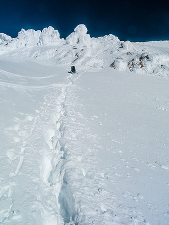 Climbing back up the steep slope to the Balfour high col.
