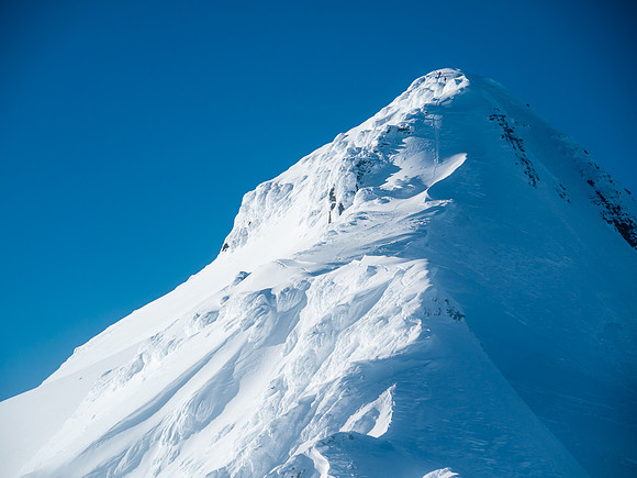 The couple from Revelstoke are barely visible on the massive ridge (right near the top).