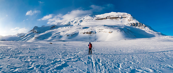 TJ skis towards Mount Balfour in great early morning lighting.