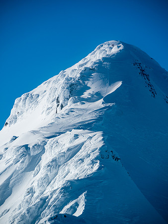 The couple from Revelstoke are barely visible on the massive ridge (right near the top).