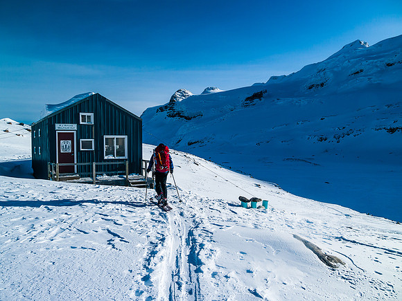 TJ approaches the tiny R.J. Ritchie / Balfour ACC Hut.