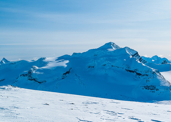Balfour in all its glory, presents a somewhat intimidating east face. The high col is just left of center, the only patch in sun light.