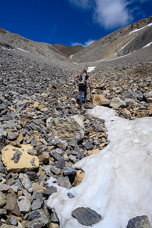 Ascending rubble slopes towards the summit.