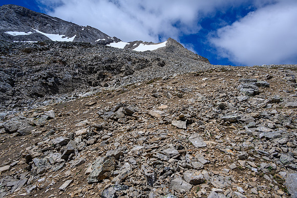 Ascending rubble slopes towards the summit.