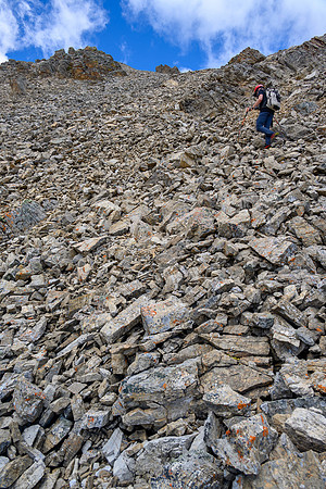 Ascending rubble slopes towards the summit.