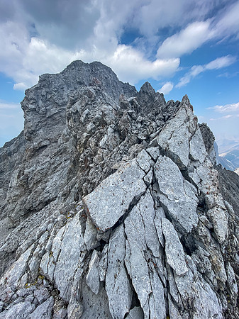 Views up the SE ridge to the summit above.