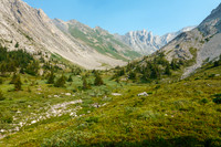Alpine meadows before the lake.
