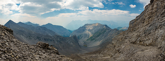 Traversing ledges back to the south face gully.