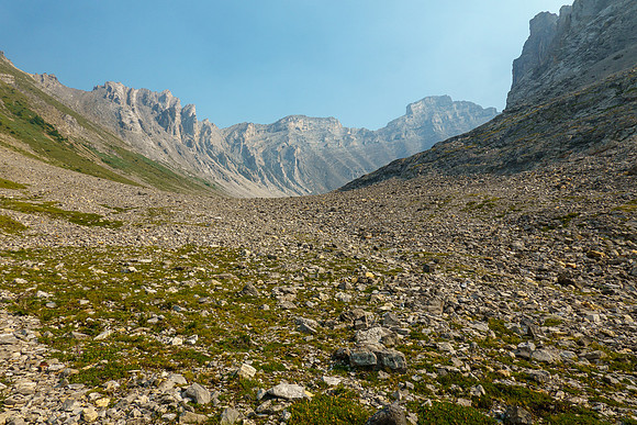 Alpine meadows before the lake.