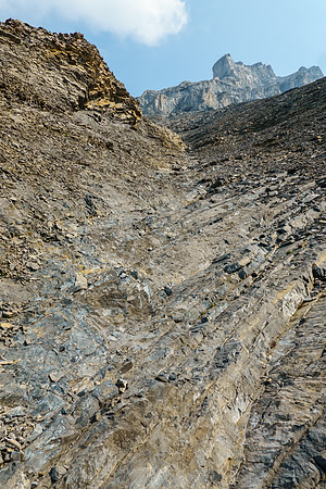 In the main gully leading to the upper col under the distinct summit tower.