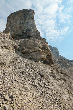 View along the south side of the upper west ridge. I'll have to descend a bit to a scree bench.