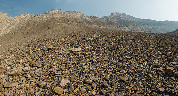 Scrambling rubble to a lower access gully on the south face.