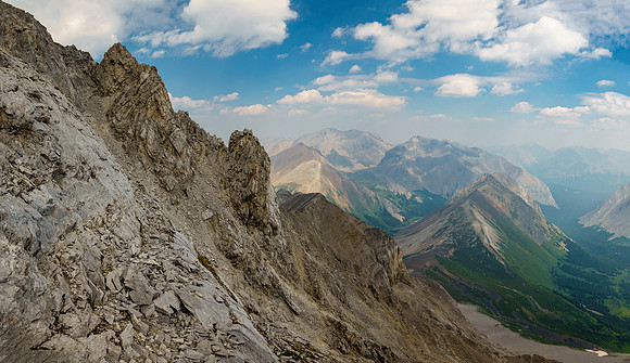 The steep scree and rubble gully that accesses the summit at left.