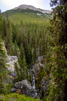 A waterfall in the creek below as we traverse high above.