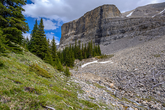 Views back up to the rock wall over Solstice Lake.