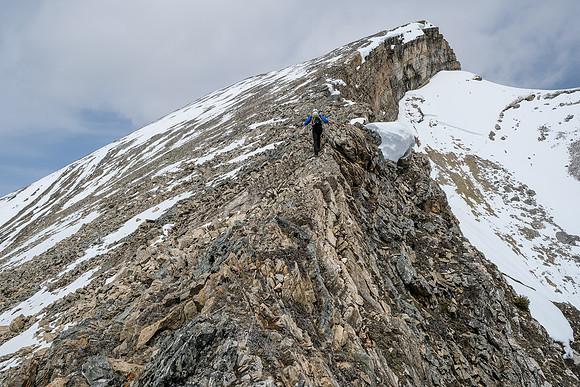 Phil ascends easy slopes to the summit of Haunted Peak.