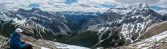 Taking in the views from part way down the summit - out of the cold wind.
