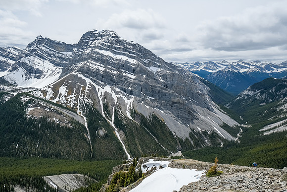 Phil is small in the terrain. An unnamed summit rising behind us.