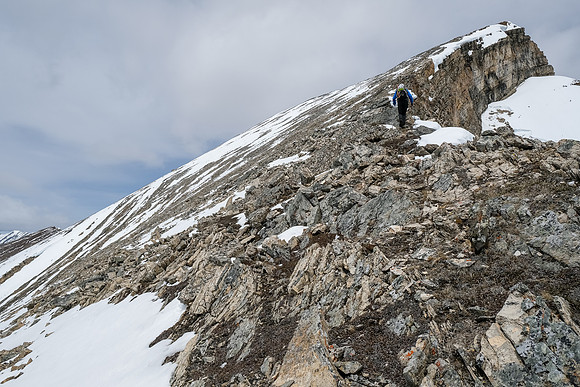 Phil ascends easy slopes to the summit of Haunted Peak.