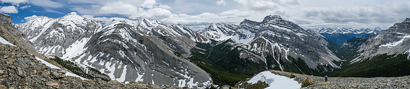 Phil is small in the terrain. An unnamed summit rising behind us.