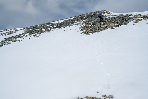 Phil ascends easy slopes to the summit of Haunted Peak.