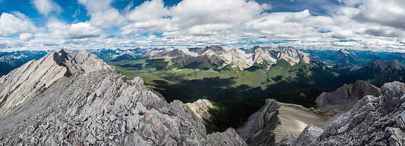 Elk Lake Pass at lower left and the huge Cascade Mountain massif filling the horizon. Mount Rundle and the town of Banff at far right.