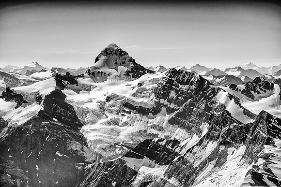 The mighty Mount Forbes with its impressive NW glacier and face rising to it's 11,851 foot summit - the highest peak entirely in Banff National Park.