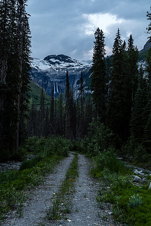 The decommissioned road continues on past the washout.