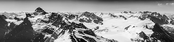 A stunning B&W panorama spanning the entire Forbes and Mons Glaciers from left to right and numerous peaks in between.