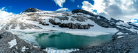 Hiking alongside the largest of the tarns.