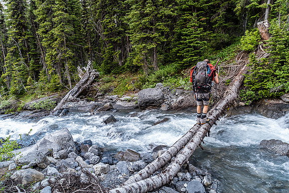 We should not have crossed here, but rather gone upwards on climber's right of this creek to the cliffs above before traversing higher.