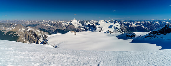 The entire main Lyell Icefield stretches out towards the Forbes and Mons Glaciers and summits. Arctomys at mid left
