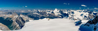 Looking over Arctomys Peak at lower left with Sullivan at left and peaks such as Murchison and Sarbach in the distance beyond.