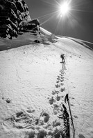 Snowshoes are off for the steep ascent ahead.