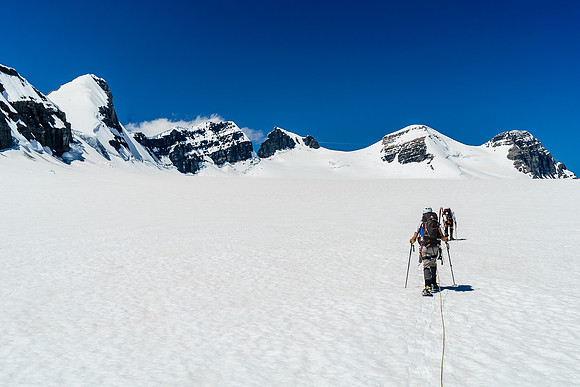 We've already come up and down Christian Peak's south ridge (L) and turned north. Now we're trudging towards the Three Lyells