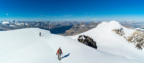 Casting long shadows as we leave the summit of Ernest on route to Edward and Rudolph at right here.