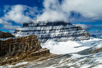 Mount Alberta looms over a tiny, insignificant Lloyd MacKay Hut and biffy.