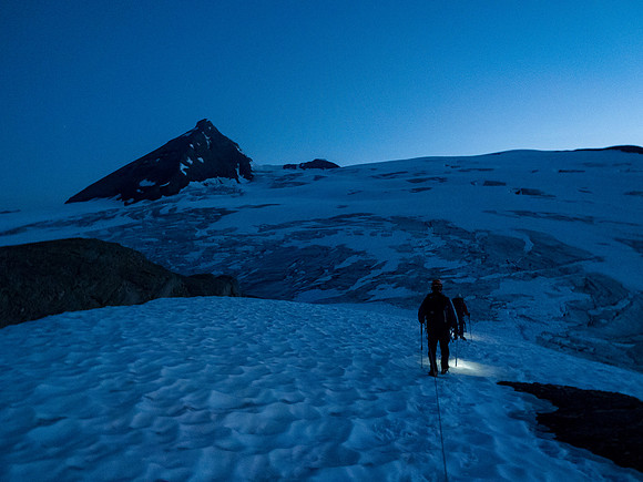 Starting out from camp with just enough light to spot crevasses.