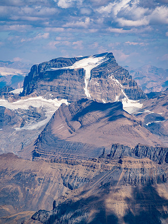 Little Alberta lies in front of Mount Woolley - it's aesthetic south couloir route visible here.