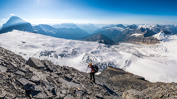 Ferenc ascends easy terrain on the south ridge with incredible views of Mount Columbia to the south and the Chess Group to the southwest.