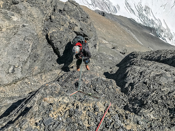Ben raps the first station we found down the SE end of the summit block.