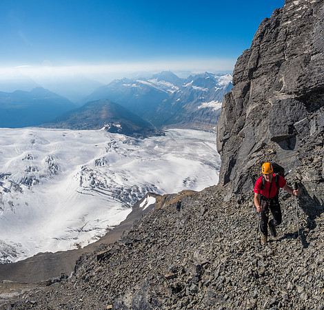Ferenc starts up the infamous scree bench running along the east face of the summit block.