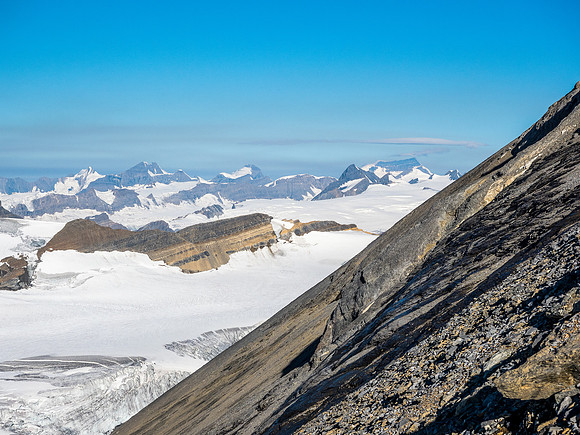 Grinding our way up the south face scree slope now.