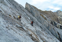 Typical slab climbing on the SW face as we contour back to the west ridge.