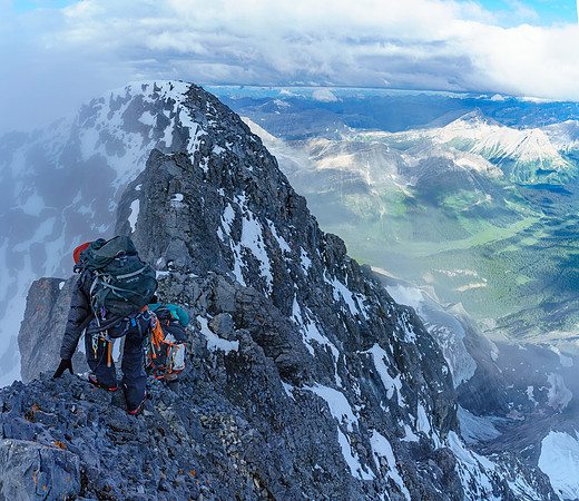 Delicate down climbing on the upper summit ridge.