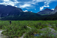 Hiking across the Burstall flats with Snow Peak rising at right.